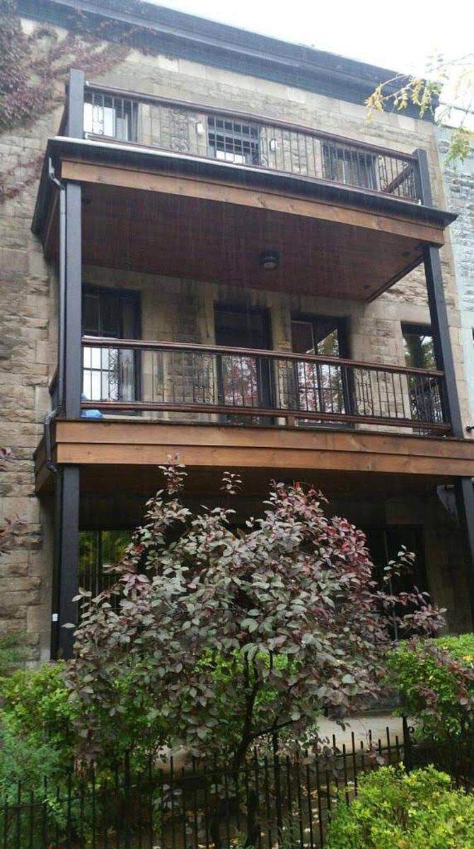 Réalisation de balcon en bois Rive Sud