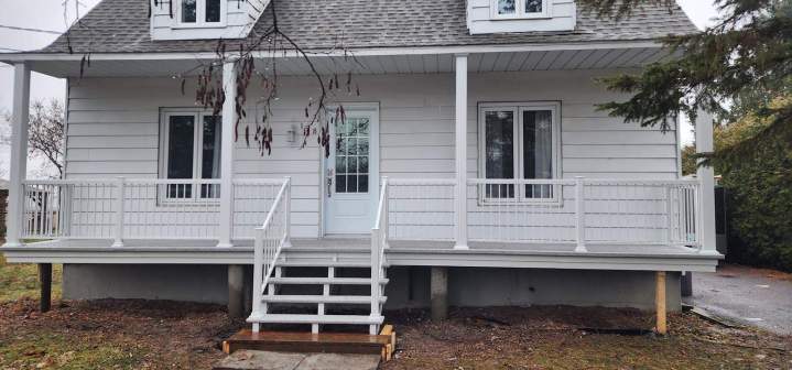 Réalisation de balcon en bois Rive Sud
