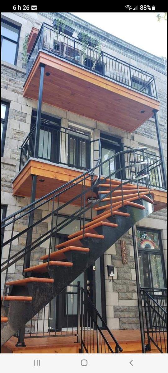 Réalisation de balcon en bois Rive Sud